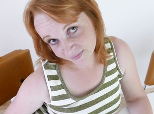 Mature redhead plays with her cunt for you