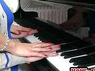 Piano teacher Tanya Tate teaches student